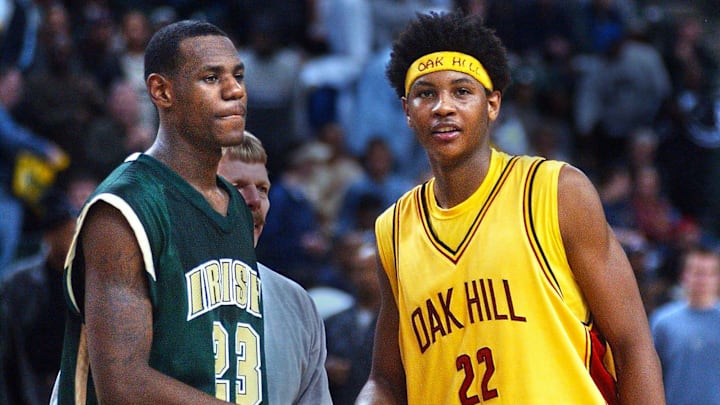 St. Vincent-St. Mary junior LeBron James and Oak Hill senior Carmelo Anthony meet at half court after the Irish's 72-66 loss. James had 36 points in the game in 2002.

Just Forget The Hype