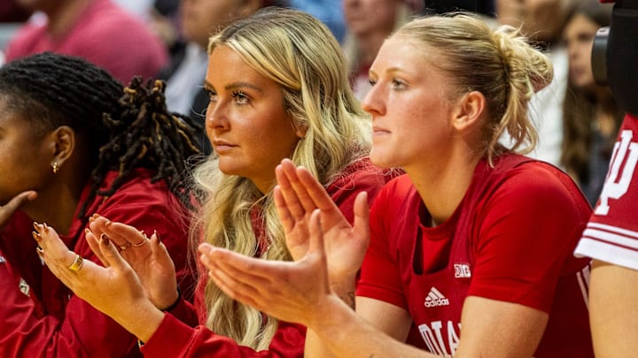 Indiana's Sydney Parrish (33) and Lexus Bargesser (1) cheer during the Indiana versus Maine women's basketball game at Simon Skjodt Assembly Hall on Sunday, Dec. 1, 2024.