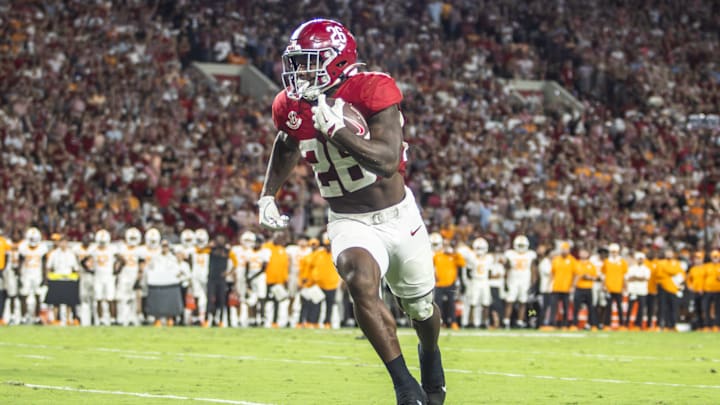 Alabama running back Jam Miller rushes against Tennessee