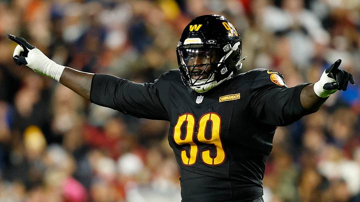 Oct 13, 2025; Landover, Maryland, USA; Washington Commanders defensive tackle Javon Kinlaw (99) reacts after a play against the Chicago Bears during the second quarter at Northwest Stadium. Mandatory Credit: Geoff Burke-Imagn Images Oct 13, 2025; Landover, Maryland, USA; Washington Commanders defensive tackle Javon Kinlaw (99) reacts after a play against the Chicago Bears during the second quarter at Northwest Stadium. Mandatory Credit: Geoff Burke-Imagn Images