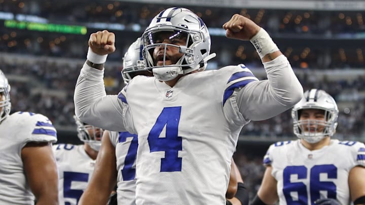 Dallas Cowboys quarterback Dak Prescott celebrates scoring a touchdown in the third quarter against the Atlanta Falcons.
