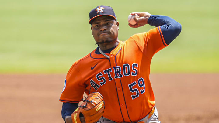 Sep 14, 2025; Cumberland, Georgia, USA; Houston Astros starting pitcher Framber Valdez (59) pitches against the Atlanta Braves during the first inning at Truist Park. Mandatory Credit: Dale Zanine-Imagn Images