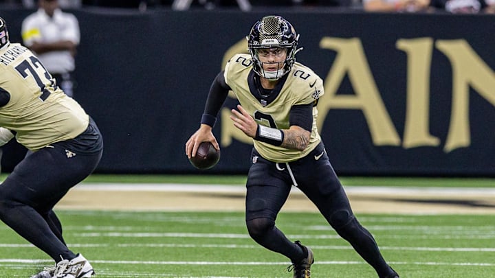 Sep 7, 2025; New Orleans, Louisiana, USA; New Orleans Saints quarterback Spencer Rattler (2) scrambles out the pocket against the Arizona Cardinals during the second half at Caesars Superdome. Mandatory Credit: Stephen Lew-Imagn Images Sep 7, 2025; New Orleans, Louisiana, USA; New Orleans Saints quarterback Spencer Rattler (2) scrambles out the pocket against the Arizona Cardinals during the second half at Caesars Superdome. Mandatory Credit: Stephen Lew-Imagn Images