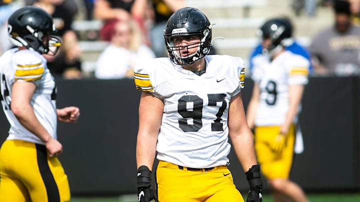 Iowa defensive lineman Caden Crawford (97) listens to instructions between drills during the Hawkeyes' final spring NCAA football practice, Saturday, April 23, 2022, at Kinnick Stadium in Iowa City, Iowa.

220423 Iowa Spring Fb 039 Jpg