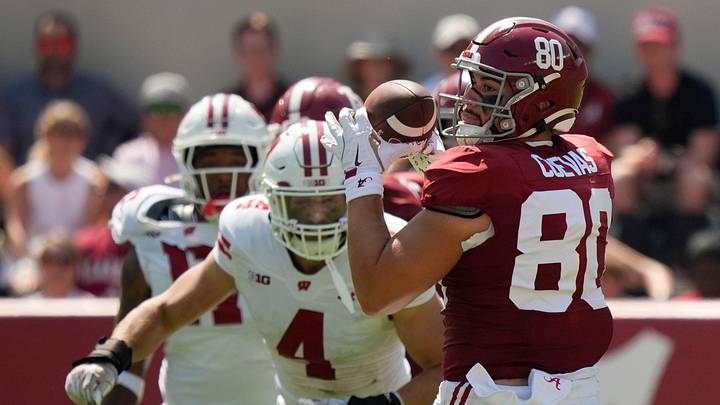 Sep 13, 2025; Tuscaloosa, Alabama, USA; Alabama tight end Josh Cuevas (80) catches a pass over the middle with Wisconsin linebacker Tackett Curtis (4) pursuing at Saban Field at Bryant-Denny Stadium. Mandatory Credit: Gary Cosby-USA TODAY Network via Imagn Images Sep 13, 2025; Tuscaloosa, Alabama, USA; Alabama tight end Josh Cuevas (80) catches a pass over the middle with Wisconsin linebacker Tackett Curtis (4) pursuing at Saban Field at Bryant-Denny Stadium. Mandatory Credit: Gary Cosby-USA TODAY Network via Imagn Images