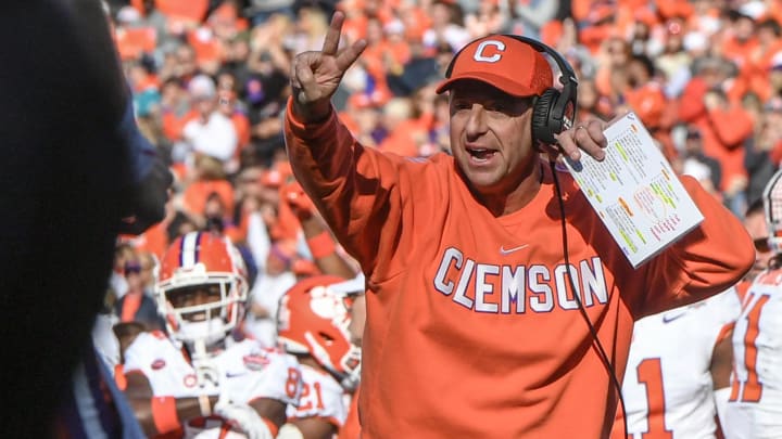 Clemson head coach Dabo Swinney signals to go for a two-point conversion against Kentucky during the fourth quarter of the TaxSlayer Gator Bowl at EverBank Stadium in Jacksonville, Florida, Friday, December 29, 2023. Clemson won 38-35.