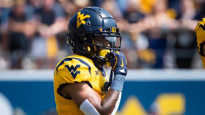 West Virginia running back Jahiem White prepares for a play in the first half of an NCAA football game against Penn State, Saturday, August 31, 2024, in Morgantown, W. Va.