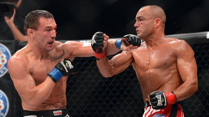 Nov 2, 2013; Long Beach, CA, USA;   Eddie Alvarez (red gloves) and Michael Chandler (blue gloves)