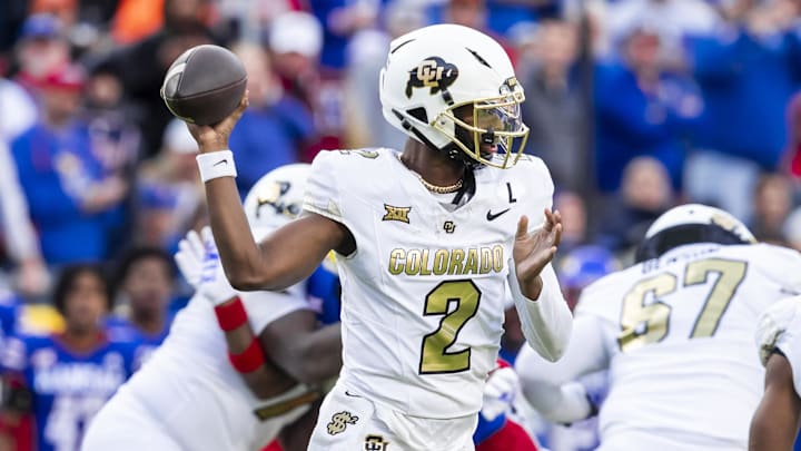 Nov 23, 2024; Kansas City, Missouri, USA;  Colorado quarterback Shedeur Sanders (2) passes the ball during the 2nd quarter between the Kansas Jayhawks and the Colorado Buffaloes at GEHA Field at Arrowhead Stadium.