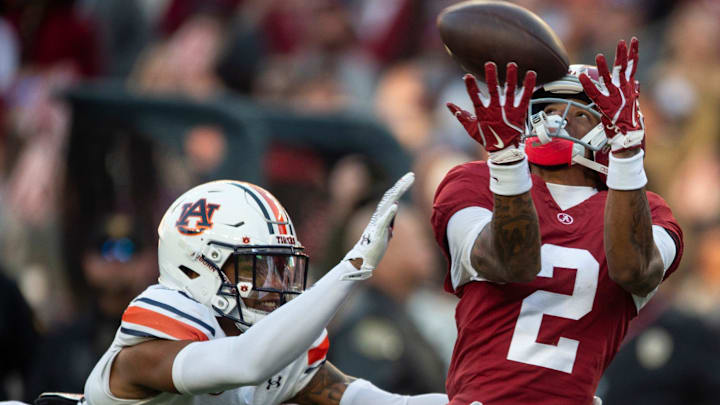 Alabama Crimson Tide wide receiver Ryan Williams (2) drops a pass guarded by Auburn Tigers defensive back Jay Crawford (23) as Auburn Tigers take on Alabama Crimson Tide at Bryant-Denny Stadium in Tuscaloosa, Ala., on Saturday, Nov. 30, 2024. Alabama Crimson Tide leads Auburn Tigers 14-6 at halftime.