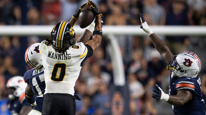 Missouri Tigers wide receiver Joshua Manning (0) catches a pass as Auburn Tigers take on Missouri Tigers at Jordan-Hare Stadium in Auburn, Ala. on Saturday, Oct. 18, 2025. Missouri Tigers defeated the Auburn Tigers 23-17 in 2OT. Missouri Tigers wide receiver Joshua Manning (0) catches a pass as Auburn Tigers take on Missouri Tigers at Jordan-Hare Stadium in Auburn, Ala. on Saturday, Oct. 18, 2025. Missouri Tigers defeated the Auburn Tigers 23-17 in 2OT.