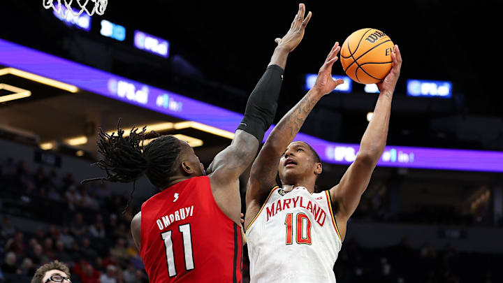 Maryland Terrapins forward Julian Reese (10) shoots against Rutgers Center Clifford Omoruyi