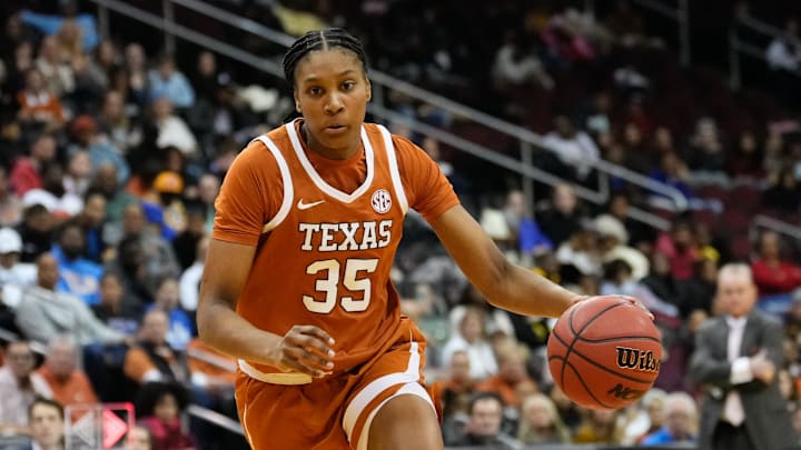 Jan 20, 2025; Newark, New Jersey, USA; Texas Longhorns forward Madison Booker (35) drives to the basket against the Maryland Terrapins during the first half at Prudential Center. Mandatory Credit: Chris Jones-Imagn Images Jan 20, 2025; Newark, New Jersey, USA; Texas Longhorns forward Madison Booker (35) drives to the basket against the Maryland Terrapins during the first half at Prudential Center. Mandatory Credit: Chris Jones-Imagn Images