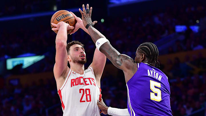 Rockets center Alperen Şengün shoots against Lakers center Deandre Ayton during Game 5 of their first-round playoffs series.