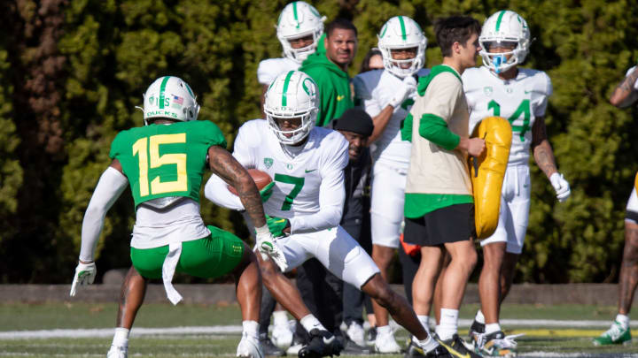 Oregon wide receiver Evan Stewart attempts to avoid defensive back Solomon Davis during practice with the Oregon Ducks Tuesday, April 9, 2024, at the Hatfield-Dowlin Complex in Eugene, Ore. Oregon wide receiver Evan Stewart attempts to avoid defensive back Solomon Davis during practice with the Oregon Ducks Tuesday, April 9, 2024, at the Hatfield-Dowlin Complex in Eugene, Ore.