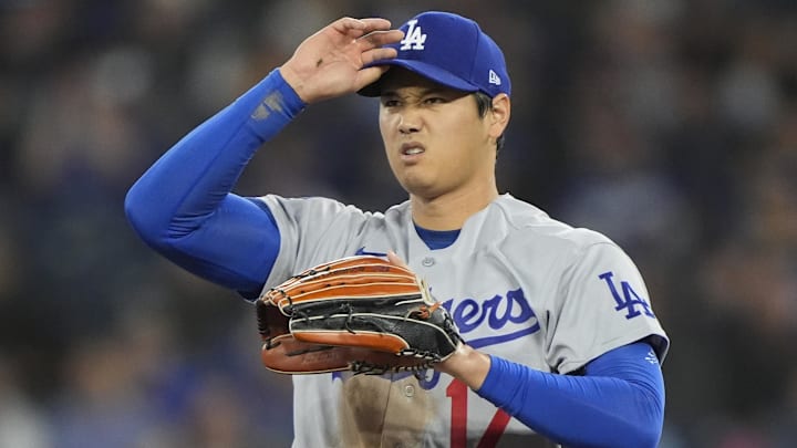 Apr 8, 2026; Toronto, Ontario, CAN; Los Angeles Dodgers starting pitcher Shohei Ohtani (17) reacts after a pitch against the Toronto Blue Jays during the second inning at Rogers Centre. Mandatory Credit: John E. Sokolowski-Imagn Images