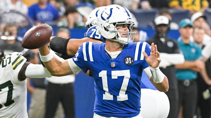 Indianapolis Colts quarterback Daniel Jones (17) throws a pass during the first half against the Green Bay Packers at Lucas Oil Stadium.