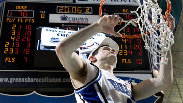 Mar 12, 2006; Greensboro, NC, USA;  Duke Blue Devils and ACC Tournament MVP J.J. Redick (4) cuts the net.