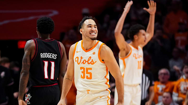 Tennessee guard Ethan Burg (35) celebrates a play during a college basketball game between Tennessee and Louisville held at Thompson-Boling Arena at Food City Center in Knoxville, Tenn., on Dec. 16, 2025. Tennessee guard Ethan Burg (35) celebrates a play during a college basketball game between Tennessee and Louisville held at Thompson-Boling Arena at Food City Center in Knoxville, Tenn., on Dec. 16, 2025.