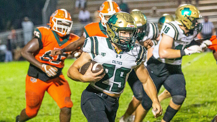 Trinity Catholic Celetics Wyatt Lucas (29) runs upfield in the first half. The Eastside Rams hosted the Trinity Catholic Celtics at Citizens Field in Gainesville, FL on Thursday, September 12, 2024. Eastside lead 16-0 at the half. [Doug Engle/Ocala Star Banner]