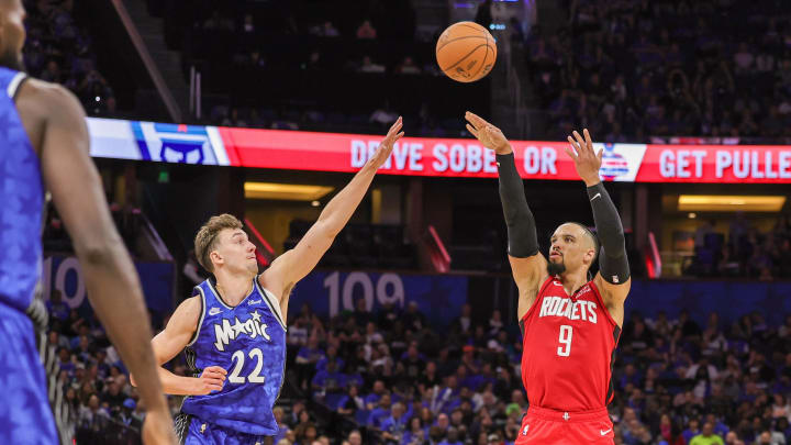 Oct 25, 2023; Orlando, Florida, USA; Houston Rockets forward Dillon Brooks (9) shoots the ball over Orlando Magic forward Franz Wagner (22)