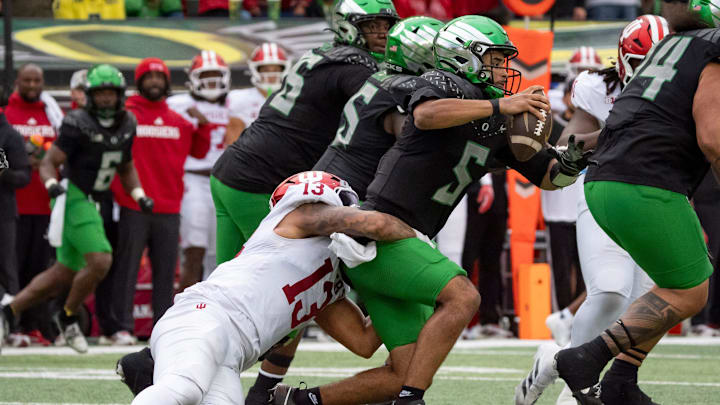 Indiana defensive lineman Kellan Wyatt sacks Oregon quarterback Dante Moore as the Oregon Ducks host the Indiana Hoosiers Oct. 11, 2025, at Autzen Stadium in Eugene, Oregon.