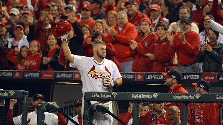 Oct 12, 2014; St. Louis, MO, USA; St. Louis Cardinals first baseman Matt Adams comes out for a curtain call after hitting a solo home run against the San Francisco Giants in the 8th inning in game two of the 2014 NLCS playoff baseball game at Busch Stadium. Mandatory Credit: Jeff Curry-Imagn Images Oct 12, 2014; St. Louis, MO, USA; St. Louis Cardinals first baseman Matt Adams comes out for a curtain call after hitting a solo home run against the San Francisco Giants in the 8th inning in game two of the 2014 NLCS playoff baseball game at Busch Stadium. Mandatory Credit: Jeff Curry-Imagn Images