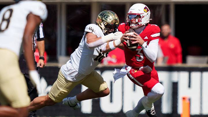Sep 26, 2026; Louisville, Kentucky, USA;  Wake Forest Demon Deacons defensive lineman Gabe Kirschke (10) sacks Louisville Cardinals quarterback Lincoln Kienholz (3) during the first quarter against the Louisville Cardinals at L&N Federal Credit Union Stadium.  Mandatory Credit: Chris Carter-Imagn Images