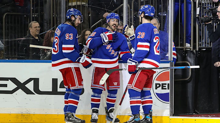 Feb 2, 2025; New York, New York, USA; New York Rangers center Mika Zibanejad (93) celebrates with center Vincent Trocheck (16) and left wing Chris Kreider (20) after a 4-2 victory against the Vegas Golden Knights at Madison Square Garden. Mandatory Credit: Danny Wild-Imagn Images