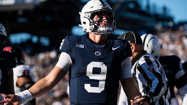 Penn State quarterback Beau Pribula celebrates after scoring a touchdown in the second half of an NCAA football game against Rutgers Saturday, Nov. 18, 2023, in State College, Pa. The Nittany Lions won, 27-6.