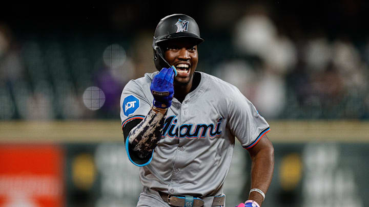 Denver, Colorado, USA; Miami Marlins left fielder Jesus Sanchez (12) celebrates as he rounds the bases on a three-run home run in the ninth inning against the Colorado Rockies at Coors Field. Denver, Colorado, USA; Miami Marlins left fielder Jesus Sanchez (12) celebrates as he rounds the bases on a three-run home run in the ninth inning against the Colorado Rockies at Coors Field.