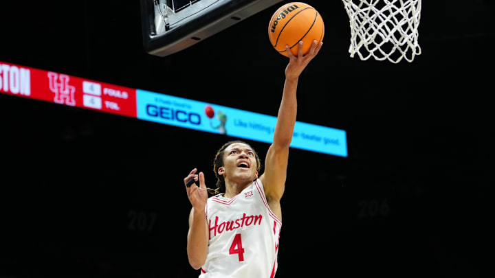 Nov 25, 2025; Las Vegas, NV, USA; Houston Cougars guard Kingston Flemings (4) goes for a layup in a 2025 Players Era Festival group play game against the Tennessee Volunteers during the first half at MGM Grand Garden Arena. Mandatory Credit: Stephen R. Sylvanie-Imagn Images
