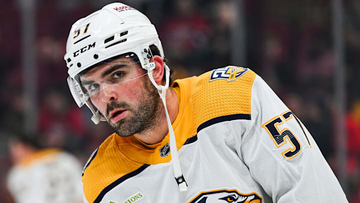 Dec 10, 2023; Montreal, Quebec, CAN; Nashville Predators defenseman Dante Fabbro (57) looks on