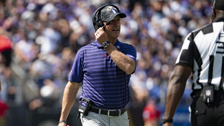 Sep 15, 2024; Baltimore, Maryland, USA;  Baltimore Ravens head coach John Harbaugh speaks with an official during  the first half against the Las Vegas Raiders at M&T Bank Stadium.