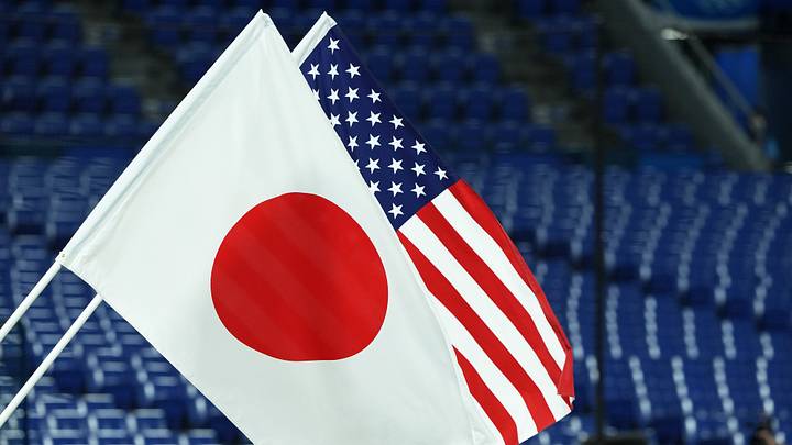 Jul 27, 2021; Yokohama, Japan; The flags of Japan and the United States of America are raised during the playing of the national anthems before the gold medal game in the Tokyo 2020 Olympic Summer Games at Yokohama Baseball Stadium. Mandatory Credit: Kareem Elgazzar-USA TODAY Sports Jul 27, 2021; Yokohama, Japan; The flags of Japan and the United States of America are raised during the playing of the national anthems before the gold medal game in the Tokyo 2020 Olympic Summer Games at Yokohama Baseball Stadium. Mandatory Credit: Kareem Elgazzar-USA TODAY Sports
