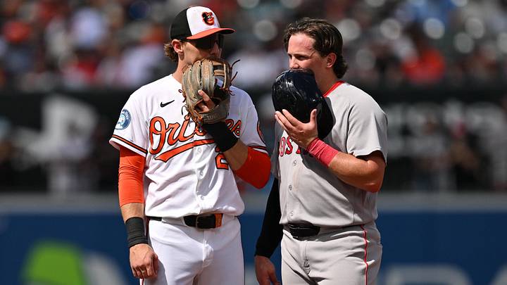 Sep 6, 2026; Baltimore, Maryland, USA; Former teammates Baltimore Orioles infielder Gunnar Henderson (2) and Boston Red Sox catcher Adley Rutschman (31) talk at second base during a time out in the third inning at Oriole Park at Camden Yards. Mandatory Credit: Jamie Sabau-Imagn Images Sep 6, 2026; Baltimore, Maryland, USA; Former teammates Baltimore Orioles infielder Gunnar Henderson (2) and Boston Red Sox catcher Adley Rutschman (31) talk at second base during a time out in the third inning at Oriole Park at Camden Yards. Mandatory Credit: Jamie Sabau-Imagn Images