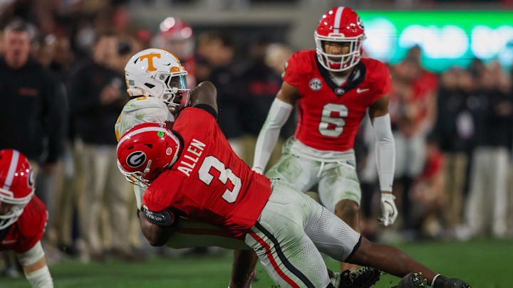 Nov 16, 2024; Athens, Georgia, USA; Tennessee Volunteers running back Dylan Sampson (6) is tackled by Georgia Bulldogs linebacker CJ Allen (3) in the third quarter at Sanford Stadium. Mandatory Credit: Brett Davis-Imagn Images
