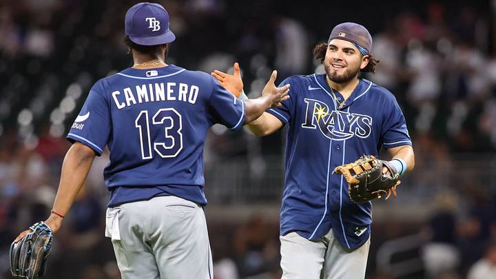 Sep 9, 2026; Atlanta, Georgia, USA; Tampa Bay Rays third baseman Junior Caminero (13) and first baseman Jonathan Aranda (8) celebrate after a victory over the Atlanta Braves at Truist Park. Mandatory Credit: Brett Davis-Imagn Images Sep 9, 2026; Atlanta, Georgia, USA; Tampa Bay Rays third baseman Junior Caminero (13) and first baseman Jonathan Aranda (8) celebrate after a victory over the Atlanta Braves at Truist Park. Mandatory Credit: Brett Davis-Imagn Images