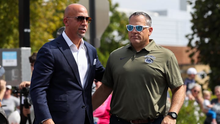 Penn State Nittany Lions head coach James Franklin (left) talks with athletic director Dr. Patrick Kraft (right) prior to the game against the Kent State Golden Flashes at Beaver Stadium. Penn State Nittany Lions head coach James Franklin (left) talks with athletic director Dr. Patrick Kraft (right) prior to the game against the Kent State Golden Flashes at Beaver Stadium.