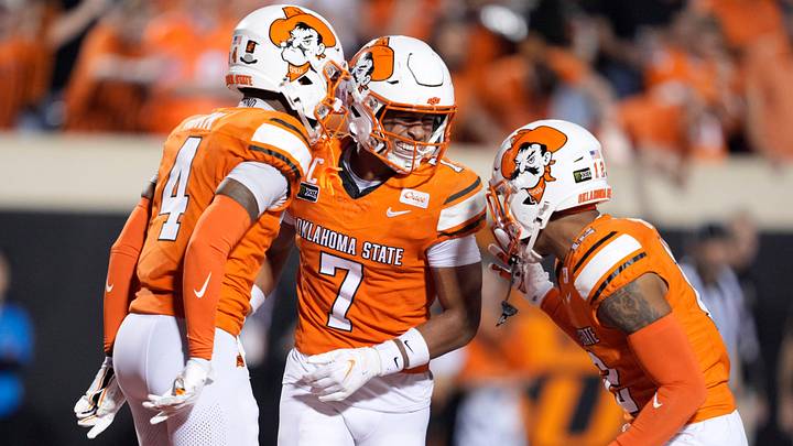 Oklahoma State Cowboys safety Quinton Hammonds (7) celebrates with cornerback Mo Horn (4) and safety Cameron Epps (12) after recovering a fumble. Oklahoma State Cowboys safety Quinton Hammonds (7) celebrates with cornerback Mo Horn (4) and safety Cameron Epps (12) after recovering a fumble.
