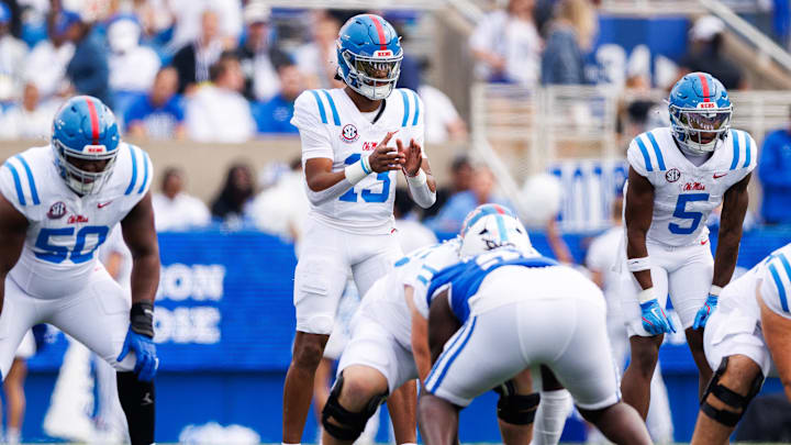 Sep 6, 2025; Lexington, Kentucky, USA; Mississippi Rebels quarterback Austin Simmons (13) waits for the snap during the first quarter against the Kentucky Wildcats at Kroger Field. Mandatory Credit: Jordan Prather-Imagn Images