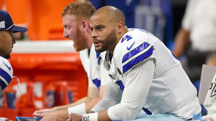 Dallas Cowboys QB Dak Prescott on the bench against the Atlanta Falcons in the fourth quarter at Mercedes-Benz Stadium