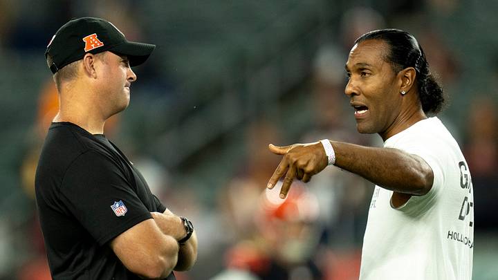 T.J. Houshmandzadeh, forner Bengal, speaks to Cincinnati Bengals head coach Zac Taylor before the NFL game at Paycor Stadium in Cincinnati on Monday, Sept. 23, 2024.
