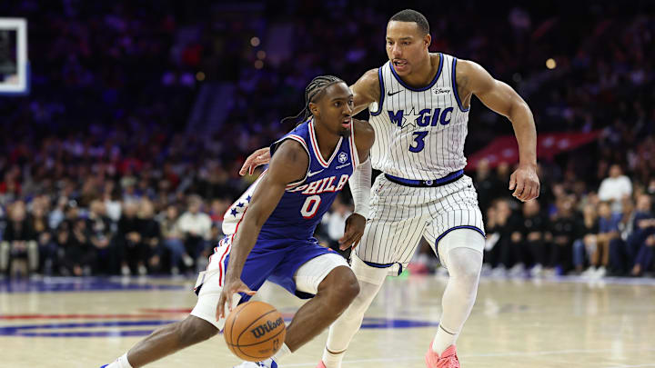 Oct 27, 2025; Philadelphia, Pennsylvania, USA; Philadelphia 76ers guard Tyrese Maxey (0) dribbles past Orlando Magic guard Desmond Bane (3) during the fourth quarter at Xfinity Mobile Arena. Mandatory Credit: Bill Streicher-Imagn Images Oct 27, 2025; Philadelphia, Pennsylvania, USA; Philadelphia 76ers guard Tyrese Maxey (0) dribbles past Orlando Magic guard Desmond Bane (3) during the fourth quarter at Xfinity Mobile Arena. Mandatory Credit: Bill Streicher-Imagn Images