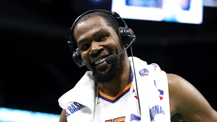 Mar 1, 2023; Charlotte, North Carolina, USA; Phoenix Suns forward Kevin Durant (35) smiles as he is interviewed following the game against the Charlotte Hornets at Spectrum Center. Mandatory Credit: Brian Westerholt-Imagn Images
