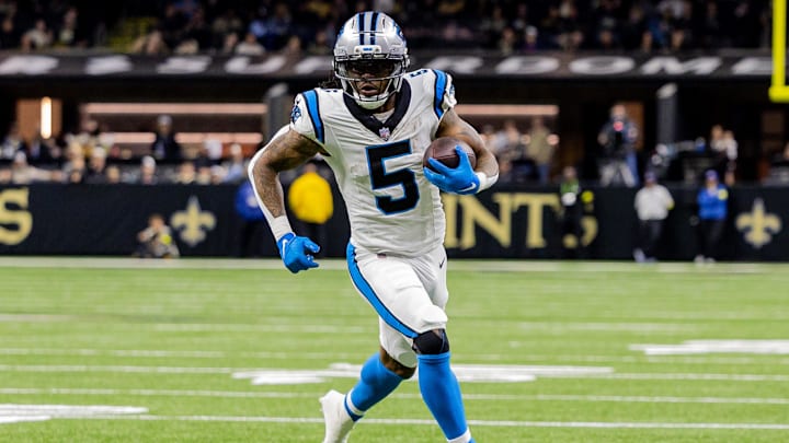 Dec 14, 2025; New Orleans, Louisiana, USA; Carolina Panthers running back Rico Dowdle (5) runs with the ball against the New Orleans Saints during the second quarter at Caesars Superdome. Mandatory Credit: Stephen Lew-Imagn Images
