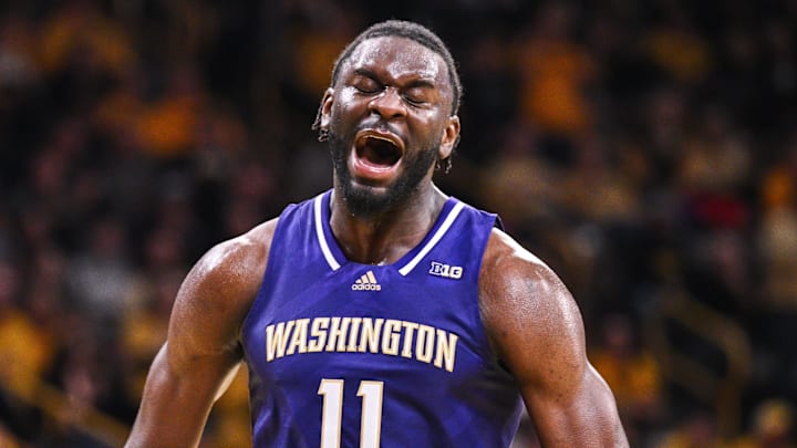 Feb 22, 2025; Iowa City, Iowa, USA; Washington Huskies center Franck Kepnang (11) reacts during the second half against the Iowa Hawkeyes at Carver-Hawkeye Arena. Mandatory Credit: Jeffrey Becker-Imagn Images