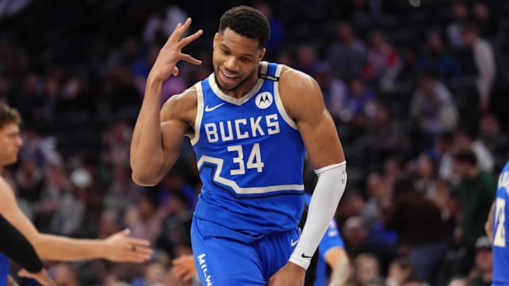 Bucks forward Giannis Antetokounmpo reacts after a play against the 76ers.