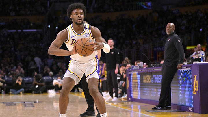 Dec 8, 2024; Los Angeles, California, USA;  Los Angeles Lakers guard Bronny James (9) handles the ball in the second half against the Portland Trail Blazers at Crypto.com Arena. Mandatory Credit: Jayne Kamin-Oncea-Imagn Images