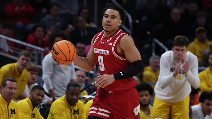 Mar 16, 2025; Indianapolis, IN, USA; Wisconsin Badgers guard John Tonje (9) dribbles downcourt during the second half against the Michigan Wolverines during the 2025 Big Ten Championship Game at Gainbridge Fieldhouse. Mar 16, 2025; Indianapolis, IN, USA; Wisconsin Badgers guard John Tonje (9) dribbles downcourt during the second half against the Michigan Wolverines during the 2025 Big Ten Championship Game at Gainbridge Fieldhouse.